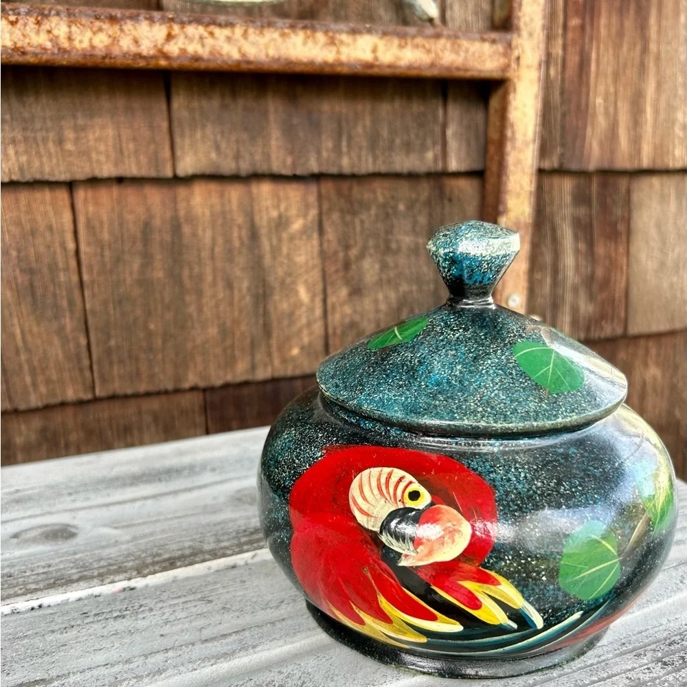 Hand Painted Wooden Jar with Red Macaw Parrot and Tree Design against a Dark Sky - Picture 9 of 11